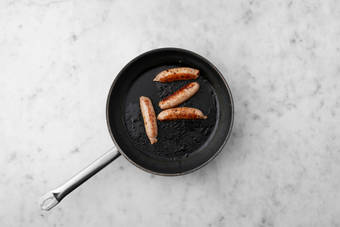 Cook the sausages & make gravy