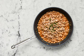 Cook beans and start sauce