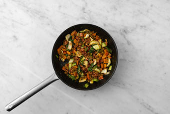 Cook veggies and finish pork