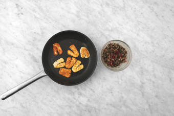 Heat the rice & cook the haloumi