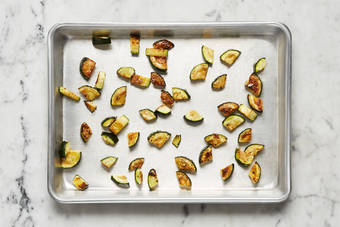 Roast zucchini and prep halloumi