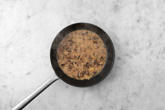 Cook mushroom gravy