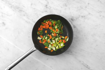 Cook veggies and chicken