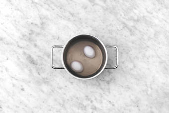 Steam the green beans & boil the eggs