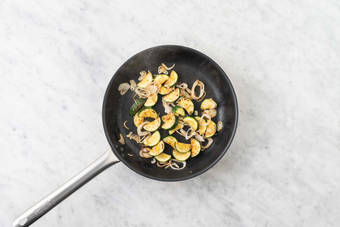 Cook chicken and veggies 