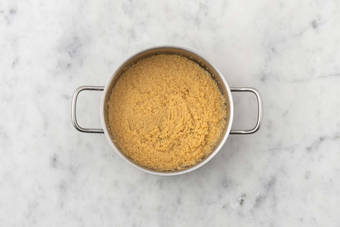 Cook couscous and salmon