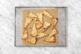 Toast the pita bread