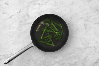 Get prepped and sauté the baby broccoli
