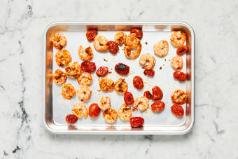 Prep and cook salmon and tomatoes