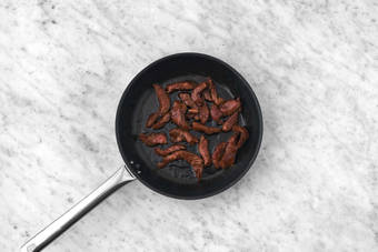 Biefstukreepjes bakken