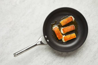 Cook Grilling Cheese