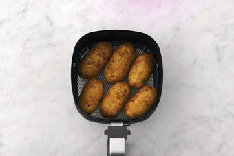 Cook the jacket potatoes 