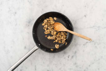 Cook chicken and prep and cook mushrooms