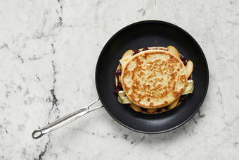 Assemble and cook panini