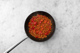 Cook peppers and chorizo 