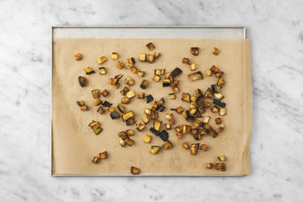 Roast the eggplant & toast the almonds