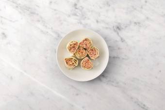 Assemble the sausage rolls