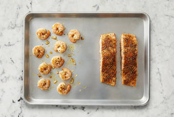 Broil shrimp and salmon