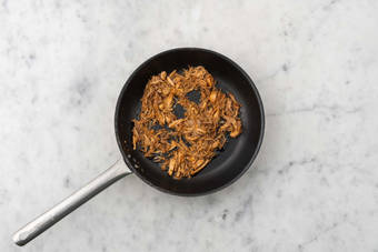 Cuocere il pulled chicken