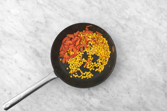 Cook the carrot and corn