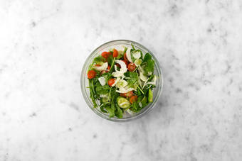 Make the sauce & toss the salad