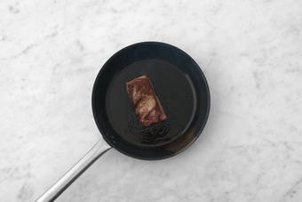 Cook the porterhouse steak