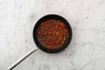 Cook chicken and chorizo