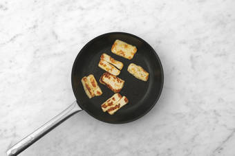 Cook the haloumi & chicken 