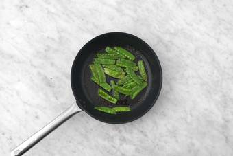 Finish mash and blister snap peas