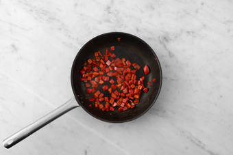 Cook chorizo and peppers