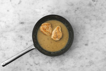 Finish chicken in gravy