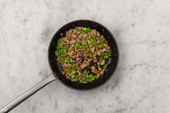 Cook beef and peppers