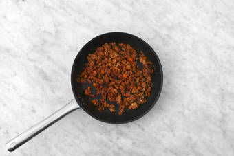 Cook chorizo and veggies