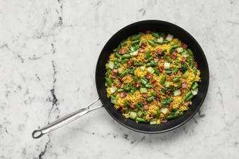 Cook veggies and make skillet rice