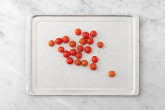 Broil tomatoes and cook chicken