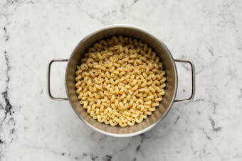 Cook cavatappi and broccolini