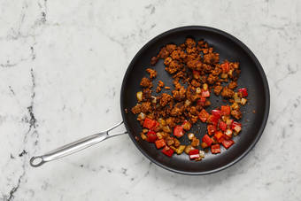 Cook chorizo and veggies