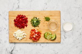 Prep veggies and make lime crema