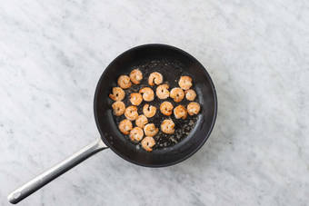 Cook onions and salmon