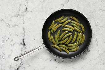 Cook snap peas and rest steaks