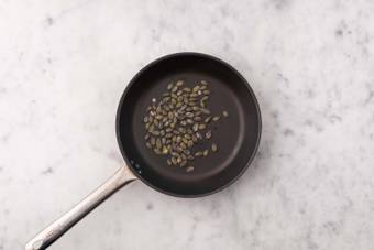 Make garlic pepitas and finish prep