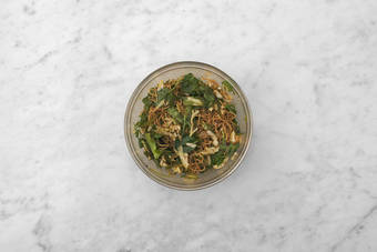 Toss the noodle salad