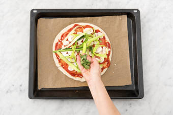 Top the pizza bases
