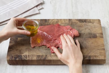 Rub a light coating of olive oil on steak
