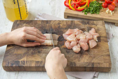Chop the chicken thighs into bite-sized chunks