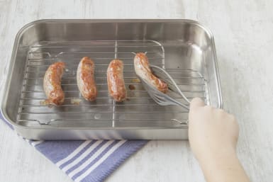 Cook the sausages on the grill