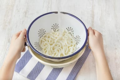 Rinse the udon noodles after cooking