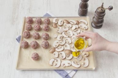 Toss oil over meatballs and mushrooms