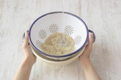 Rinse rice with cold water