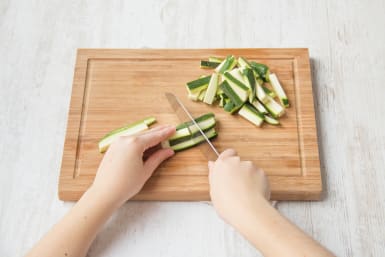 Chop zucchini into sticks